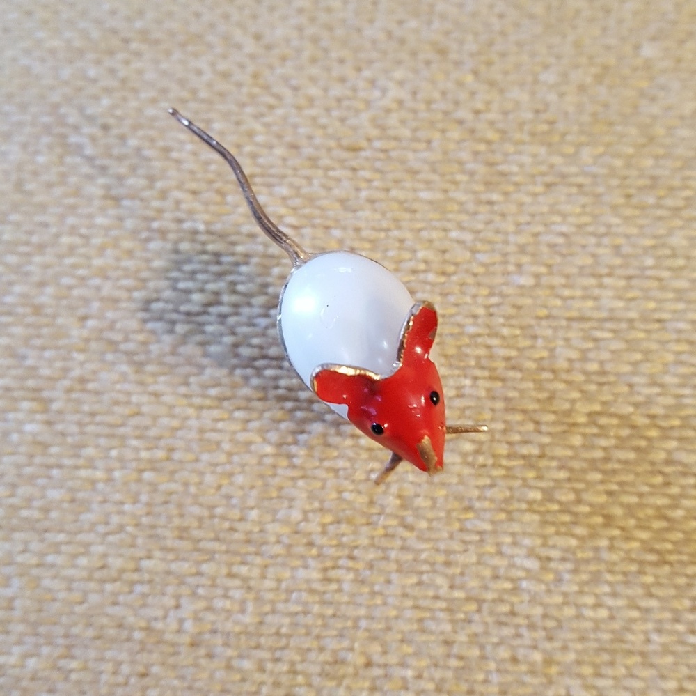 The littlest mouse pin.